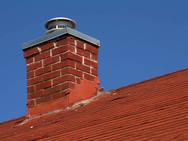 Chimney on the roof of a private house.