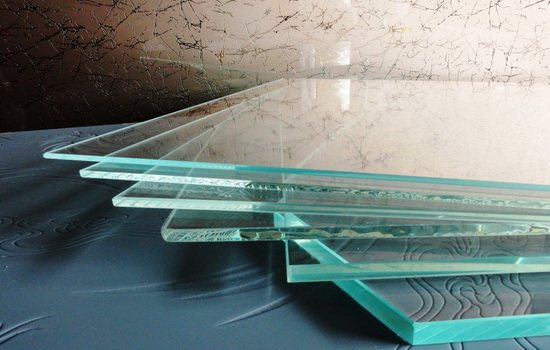 What types of glass are used in double-glazed windows