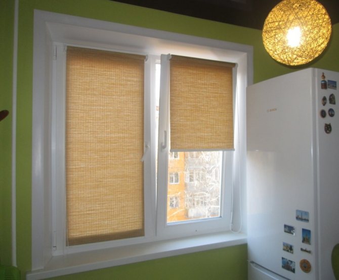 Ajar plastic window sash with roller blind
