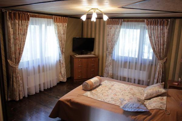 Designul atent gândit al camerei din colț va transforma camera într-un cuib confortabil